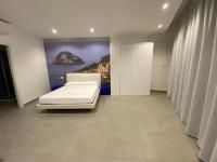 Posteľ alebo postele v izbe v ubytovaní Torre del mare Rooms