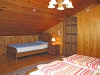 Łóżko lub łóżka w pokoju w obiekcie Apartment Villa Ursa by Interhome