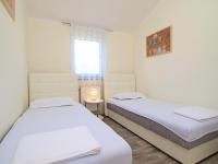 Postel nebo postele na pokoji v ubytování Apartment Marko-2 by Interhome