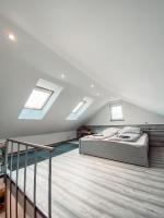 Posteľ alebo postele v izbe v ubytovaní Eklektika Apartman Balatonalmádi