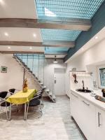 Kuchyňa alebo kuchynka v ubytovaní Eklektika Apartman Balatonalmádi