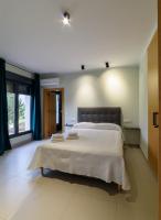 Postel nebo postele na pokoji v ubytování Apartamentos Rurales La Gloria de Yuste
