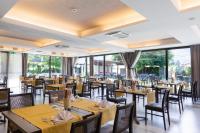 Reštaurácia alebo iné gastronomické zariadenie v ubytovaní Appartamento Campagnola 1