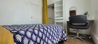 Tempat tidur dalam kamar di Dormiraneris R&eacute;sidence Amaryllis
