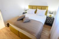 Postel nebo postele na pokoji v ubytování Luxury Apartments Leonika