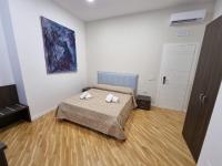 Posteľ alebo postele v izbe v ubytovaní BARBAJA SUITES IN STREET TOLEDO 205