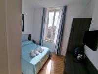 Posteľ alebo postele v izbe v ubytovaní BARBAJA SUITES IN STREET TOLEDO 205