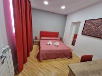 Posteľ alebo postele v izbe v ubytovaní BARBAJA SUITES IN STREET TOLEDO 205