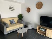 TV a/nebo společenská místnost v ubytování Studio Marika