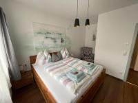 Łóżko lub łóżka w pokoju w obiekcie Kunstwerk AppARTement