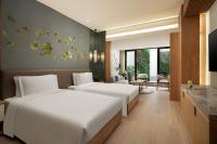 Crowne Plaza Shanghai Nanjing Road by IHGにあるベッド