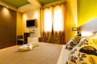 Postel nebo postele na pokoji v ubytování Agriturismo AgrileisureTime