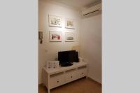 TV a/nebo společenská místnost v ubytování Apartamento San Pedro-Corredera