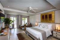 Ein Bett oder Betten in einem Zimmer der Unterkunft Rocky's Boutique Resort - Veranda Collection Samui