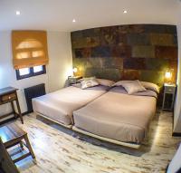 Posteľ alebo postele v izbe v ubytovaní Green Peaks B&B Country House Alojamiento Rural
