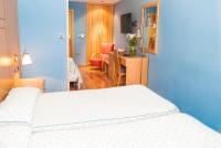 A bed or beds in a room at Reino de Granada