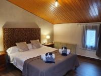 Posteľ alebo postele v izbe v ubytovaní Casa Marèlia, Costa Daurada Rural