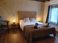 Posteľ alebo postele v izbe v ubytovaní Casa Marèlia, Costa Daurada Rural
