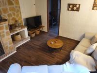 Televízia a/alebo spoločenská miestnosť v ubytovaní Casa Marèlia, Costa Daurada Rural