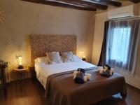 Posteľ alebo postele v izbe v ubytovaní Casa Marèlia, Costa Daurada Rural