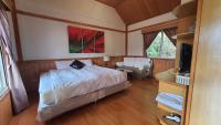 En eller flere senge i et v&aelig;relse p&aring; Yosemite Park B&amp;B