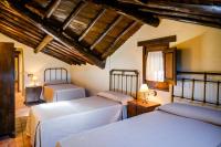A bed or beds in a room at Un espacio único, 'La Casona del Señor' con bodega