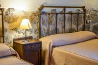 A bed or beds in a room at Un espacio único, 'La Casona del Señor' con bodega