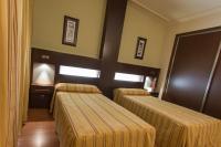 Postel nebo postele na pokoji v ubytování Hotel Los 5 Pinos