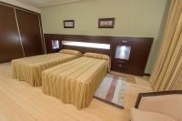 Postel nebo postele na pokoji v ubytování Hotel Los 5 Pinos