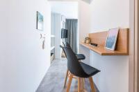 Televízia a/alebo spoločenská miestnosť v ubytovaní The Boutique
