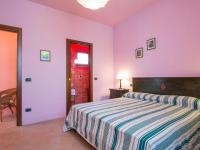 Posteľ alebo postele v izbe v ubytovaní Holiday Home Il Sorriso by Interhome