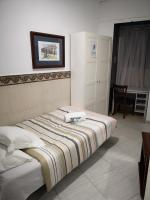 Postel nebo postele na pokoji v ubytování Motel lavapies