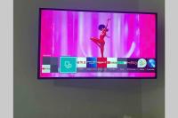 TV a/nebo společenská místnost v ubytování Exclusiva Villa de Lujo (5*****) en Corralejo - Fuerteventura (Islas Canarias)