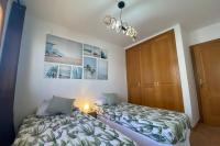 Postel nebo postele na pokoji v ubytování Exclusiva Villa de Lujo (5*****) en Corralejo - Fuerteventura (Islas Canarias)