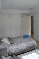 Posteľ alebo postele v izbe v ubytovaní CASA VACACIONAL MÁLAGA 14 Chalet