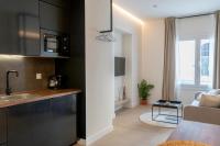 Kuchyň nebo kuchyňský kout v ubytování Suites Alfonso X