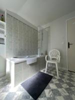Ein Badezimmer in der Unterkunft Le Grand Chalet