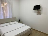 A bed or beds in a room at Le bougainvillea 2