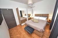 Łóżko lub łóżka w pokoju w obiekcie Villa Teuta ZadarVillas