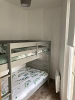Katil dua tingkat atau katil-katil dua tingkat dalam bilik di Moorea Coeur du Tr&eacute;port