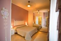 A bed or beds in a room at SUITE MORGANA in San Zeno