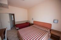 Posteľ alebo postele v izbe v ubytovaní Alba Hotel