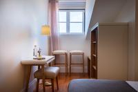 Postel nebo postele na pokoji v ubytování Memoria Lisboa FLH Hotels