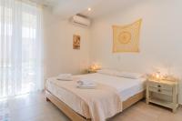 Posteľ alebo postele v izbe v ubytovaní Christina Boutique Studios Elounda