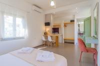 Posteľ alebo postele v izbe v ubytovaní Christina Boutique Studios Elounda