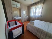 Posteľ alebo postele v izbe v ubytovaní Sirmione Acque del Garda Apartments
