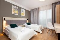 Postel nebo postele na pokoji v ubytování Business Studio Apartments Wolska by Noclegi Renters