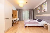 Postel nebo postele na pokoji v ubytování Business Studio Apartments Wolska by Noclegi Renters