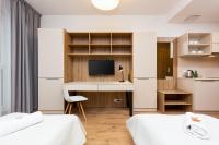 Postel nebo postele na pokoji v ubytování Business Studio Apartments Wolska by Noclegi Renters