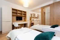 Postel nebo postele na pokoji v ubytování Business Studio Apartments Wolska by Noclegi Renters